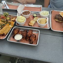 Nachos, wings, sides, brisket sandwich