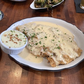 Moonshine Grill - Country fried steak, Brussels sprouts and shrimp puffs - Southern Near Me - Austin, Texas Moonshine Grill - Country fried steak, Brussels sprouts and shrimp puffs - Southern Near Me - Austin, Texas