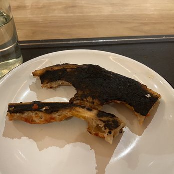 Storia Cucina - Burnt pizza crust - Italian Near Me - Bellingham, Washington Storia Cucina - Burnt pizza crust - Italian Near Me - Bellingham, Washington