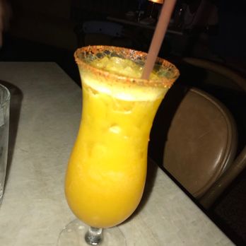 Red Rooster Overtown - Garvey rum punch - Cocktail Bars Near Me - Miami, Florida Red Rooster Overtown - Garvey rum punch - Cocktail Bars Near Me - Miami, Florida