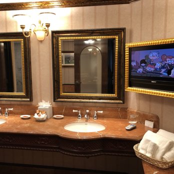Peppermill Reno - Tuscany bathroom w/ his and hers sink along with a TV - Casinos Near Me - Reno, Nevada Peppermill Reno - Tuscany bathroom w/ his and hers sink along with a TV - Casinos Near Me - Reno, Nevada