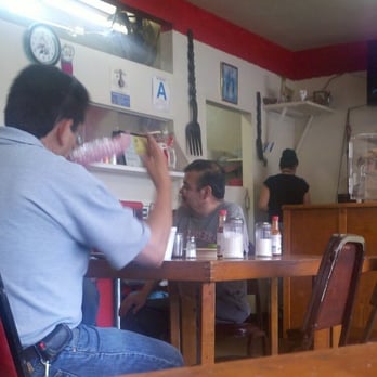 Lupita's Restaurant - Almost facing the camera is the owner who visits with his customers - Mexican Near Me - Los Angeles, California