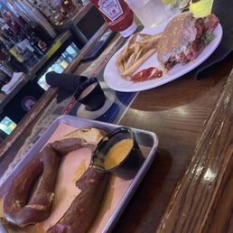 Soft pretzel and beer cheese. Bayu burger and fries Soft pretzel and beer cheese. Bayu burger and fries