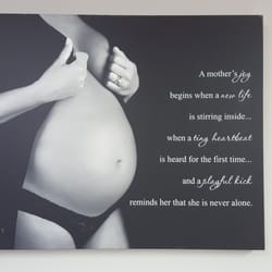 Anticipation Ultrasound Studio - What a pretty pregnant belly and a great saying.