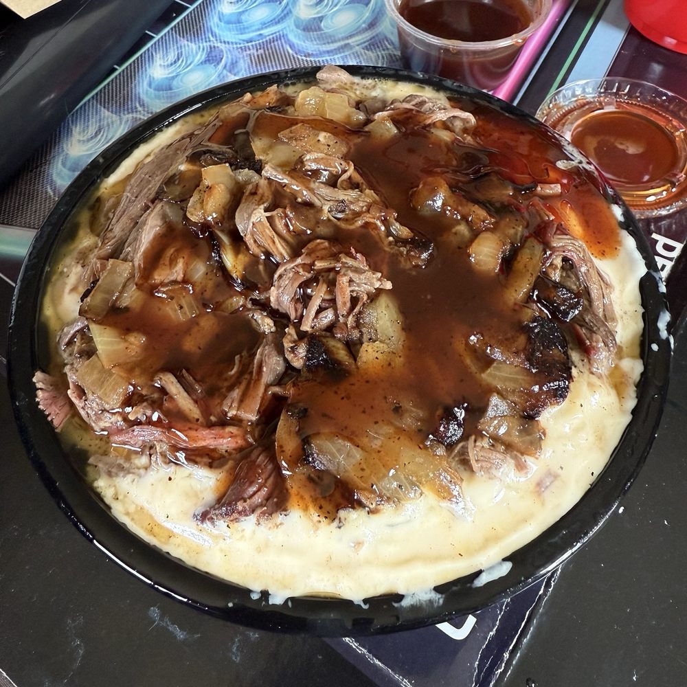 The Smokin' C's BBQ - Mac n cheese Q'Bowl with brisket and fried onions topped with their sweet heat BBQ sauce - Barbeque Near Me