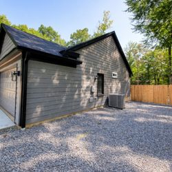 Welch Landscape Solutions - A gravel driveway and privacy fence we installed in Charlotte NC.