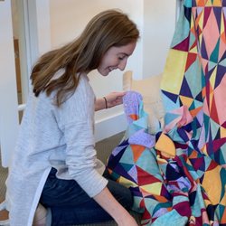 Cate's Sew Modern - Preparing a client's quilt for long-arming, which we offer using our beautiful Bernina Q24!