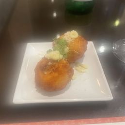 Complimentary appetizer I had. Some kind of rice ball. Complimentary appetizer I had. Some kind of rice ball.