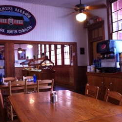 School House BBQ - Sitting at a table looking at the buffet bar.