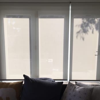 The Shade Store - 3% gray solar shades for bifold doors. Two shades of varying width. Bright direct sunlight makes for a slightly more opaque look. - Shades & Blinds Near Me - Pasadena, California The Shade Store - 3% gray solar shades for bifold doors. Two shades of varying width. Bright direct sunlight makes for a slightly more opaque look. - Shades & Blinds Near Me - Pasadena, California