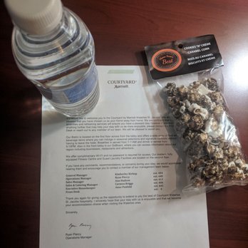 Courtyard by Marriott Waterloo St. Jacobs - Welcome goodies - complimentary bottled water, and cookies and cream caramel corn (say all that fast!) - Hotels Near Me - Waterloo, Ontario