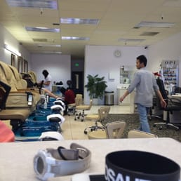 Sitting at the nail drying station