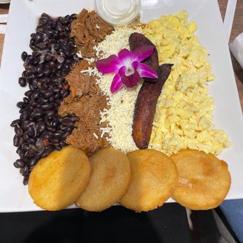 La Industria Bakery - This dish was the best so far arepas were cold but beans tasted really good . - Pancakes Near Me - Miami, Florida