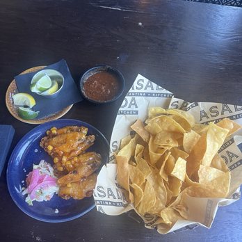 Asada Cantina + Kitchen - Chips and Salsa and Mango Habanero wings. - Tacos Near Me - San Clemente, California Asada Cantina + Kitchen - Chips and Salsa and Mango Habanero wings. - Tacos Near Me - San Clemente, California