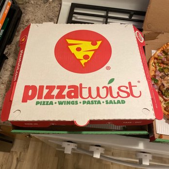 Pizza Twist - a box of pizza with a slice missing - Pizza Near Me - Yuba City, California Pizza Twist - a box of pizza with a slice missing - Pizza Near Me - Yuba City, California