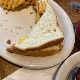 Grilled cheese sandwich... Where's the grilled, & butter?