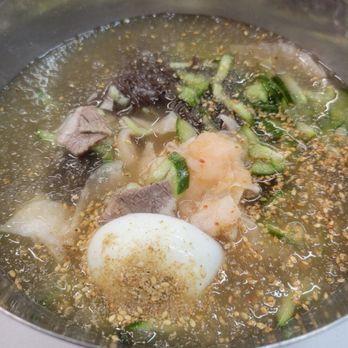 Yoo's Place - Icy, refreshing chic mul naengmyun (cold noodle soup). The staff will cut the uber-chewy noodles for you to make it easier to eat. - Korean Near Me - Irvine, California