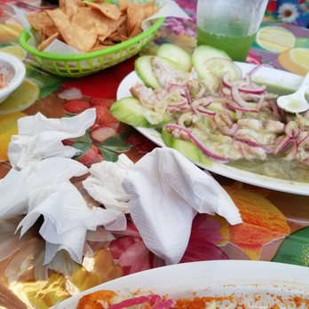 Tacos El Limoncito - Finally enjoyed the Aguachiles! Those napkins on the table are from wiping my forehead and nose! - Mexican Near Me - Inglewood, California