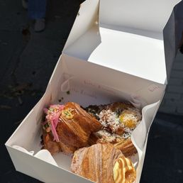 july menu: skirt steak croissant, madame lorraine, peach & sweet corn cruffin