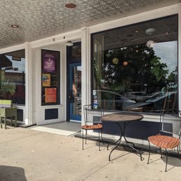 Exterior outside entrance of Rosalind Coffee TX - Outdoor seating and bench - Garland, Texas Exterior outside entrance of Rosalind Coffee TX - Outdoor seating and bench - Garland, Texas
