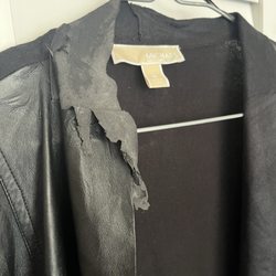 OXXO Care Cleaners Aventura - Destroyed jacket that was not in this condition when being dropped off.