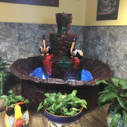 A fountain in the entryway. A fountain in the entryway.