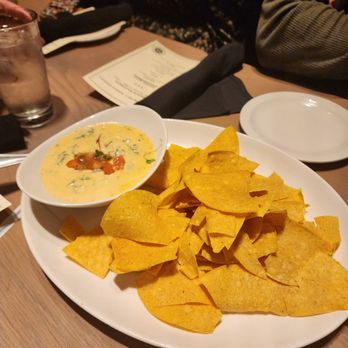 Firebirds Wood Fired Grill - Lobster spinach queso - Steakhouses Near Me - Plano, Texas Firebirds Wood Fired Grill - Lobster spinach queso - Steakhouses Near Me - Plano, Texas