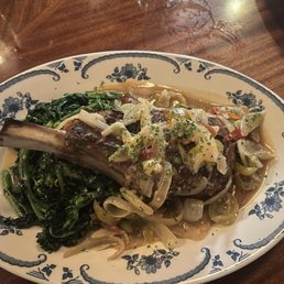 Grilled veal chop with cherry peppers and broccoli rabe Grilled veal chop with cherry peppers and broccoli rabe