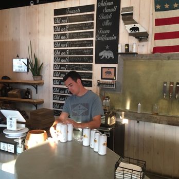 Honey River Brewing - Bar, beer list on wall, cans to go - Breweries Near Me - Anaheim, California Honey River Brewing - Bar, beer list on wall, cans to go - Breweries Near Me - Anaheim, California