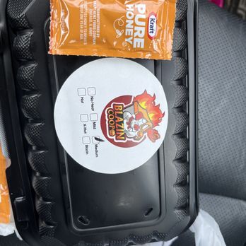Blazin Coop - a bag of chips and a sticker - Food Trucks Near Me - Ann Arbor, Michigan