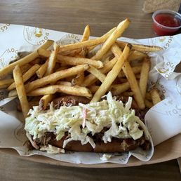 The Carolina dog. Beef dog with pulled pork and coleslaw. The bun is to die for also!! The Carolina dog. Beef dog with pulled pork and coleslaw. The bun is to die for also!!