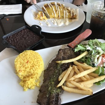 Sofrito Latin Cafe - Churrasco in the foreground, Cachapa in the background - Latin American Near Me - Orlando, Florida Sofrito Latin Cafe - Churrasco in the foreground, Cachapa in the background - Latin American Near Me - Orlando, Florida