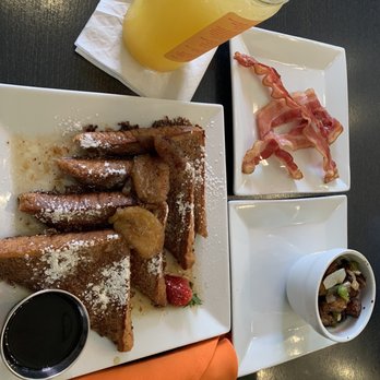 Mango Mangeaux - Bananas's foster french toast, mango lemonade, skillet potatoes - New American Near Me - Hampton, Virginia Mango Mangeaux - Bananas's foster french toast, mango lemonade, skillet potatoes - New American Near Me - Hampton, Virginia