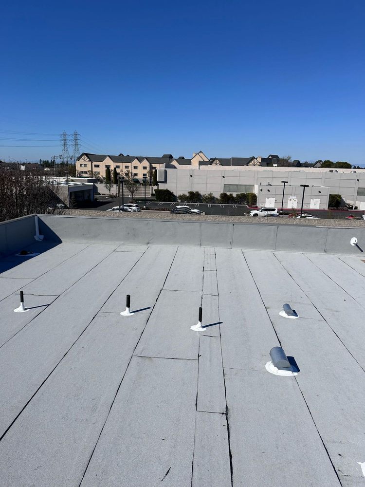 Slide of Tecun’s Roofing