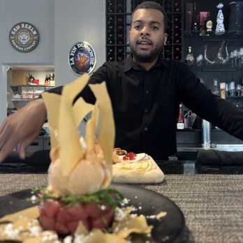 Fin & Tonic - Tuna Tartare. Presentation is everything! Of course the knowledgeable Alexander in the background. - New American Near Me - Suffolk, Virginia Fin & Tonic - Tuna Tartare. Presentation is everything! Of course the knowledgeable Alexander in the background. - New American Near Me - Suffolk, Virginia
