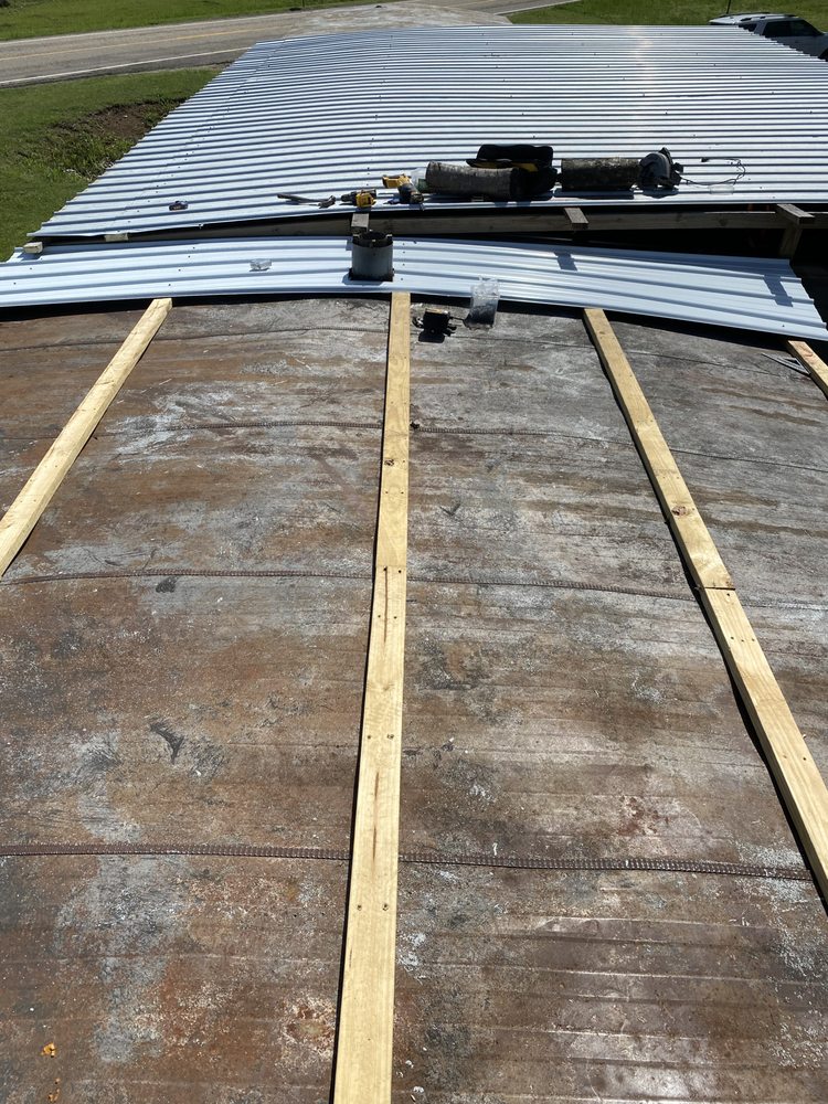 Slide of Elevate Roofing & Builders