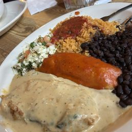 Two item combo with chile relleno (requested creama sauce in place of red) and tamal and black beans Two item combo with chile relleno (requested creama sauce in place of red) and tamal and black beans