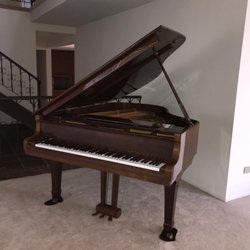 D & J Piano Movers - My grand piano