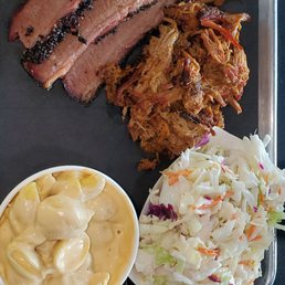 BBQ pork, brisket, Gouda Mac, Fresh Slaw. BBQ pork, brisket, Gouda Mac, Fresh Slaw.
