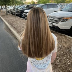 Platinum Hair Salon - My daughter hair after cut and a few highlights for dimension.