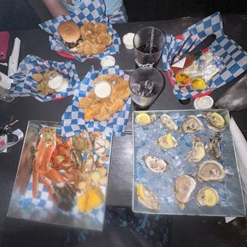 Pirates Deck - Mushroom Swiss Burger, Home Chips, Fried Pickles, ROTTEN raw oysters, and Seafood Boil - Sports Bars Near Me - Oak Island, North Carolina
