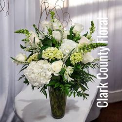 Clark County Floral - White and green floral arrangement.