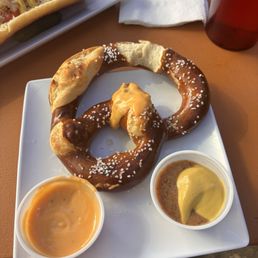 Pretzel with mustard and beer cheese Pretzel with mustard and beer cheese