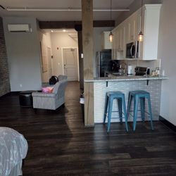 View from end of the bed towards door.