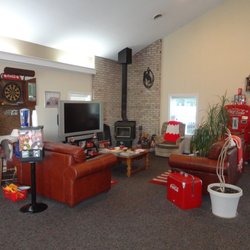 King O' Kuts Barbershop aka Mason Barbershop - Relax by the charming wood stove while you have a short wait for your barber