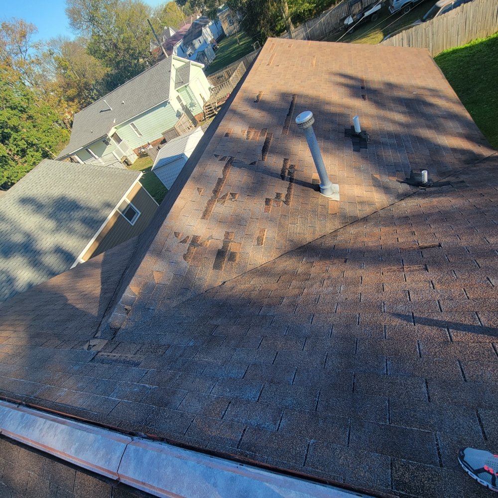 Slide of Benitez Roofing