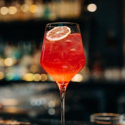 Petrol Head Bar & Grill - Rosso Corsa. 
Non-alcoholic cocktail. 
N/A Almave Ambar, blood orange, lemon, great fruit.