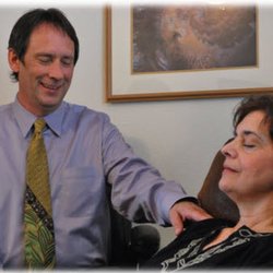 Santa Fe Hypnotherapy and NLP - Patrick working with a Client in his office