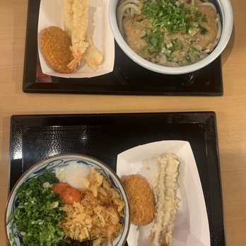 Marugame Udon - Tonkotsu udon (top right), mentai kamatama (bottom left), shrimp and squid tempura, and potato croquette. - Japanese Near Me - Costa Mesa, California Marugame Udon - Tonkotsu udon (top right), mentai kamatama (bottom left), shrimp and squid tempura, and potato croquette. - Japanese Near Me - Costa Mesa, California