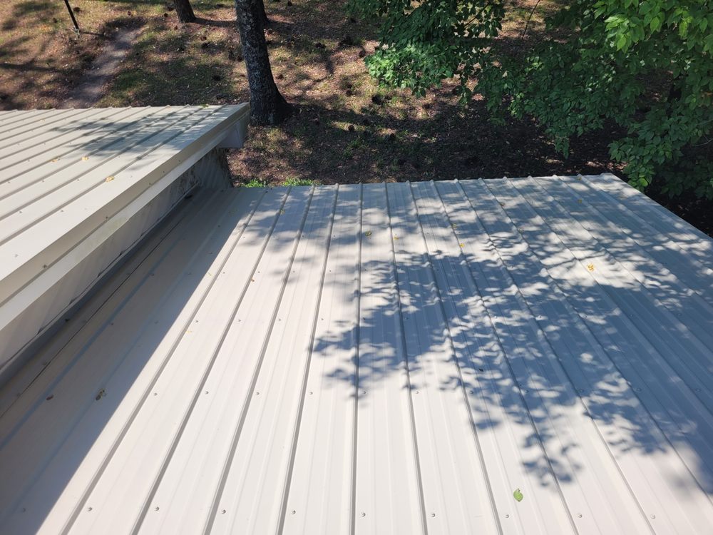 Slide of Moore Elite Roofing